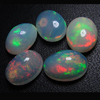 calebrated size 7x9 mm oval - Ethiopian Opal - really - tope grade high quality CABOCHON - oval shape - each pcs - have amazing - beautifull - flashy fire all around in the stone -5 pcs - approx -- STUNNING QUALITY - VERY VERY RARE